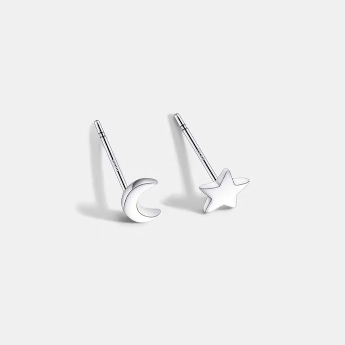 Star and moon ear studs