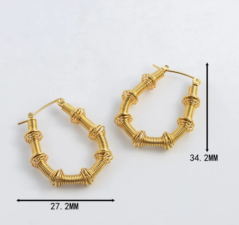 E135-Bamboo U-Shaped Spring Earrings Gold